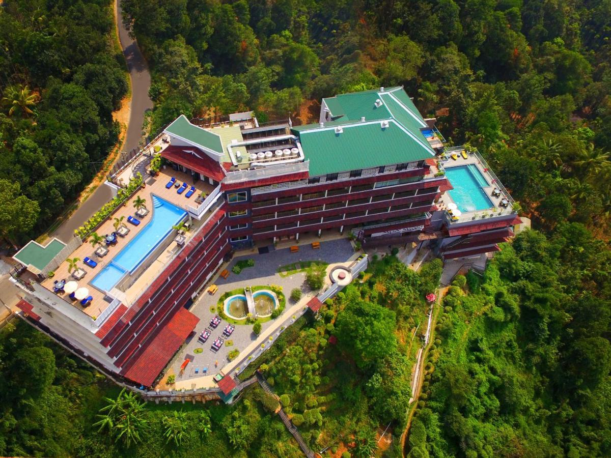โรงแรมเดอะ พาโนรามิก เกตะเวย์ มุนนาร์ ภายนอก รูปภาพ Aerial view of the hotel