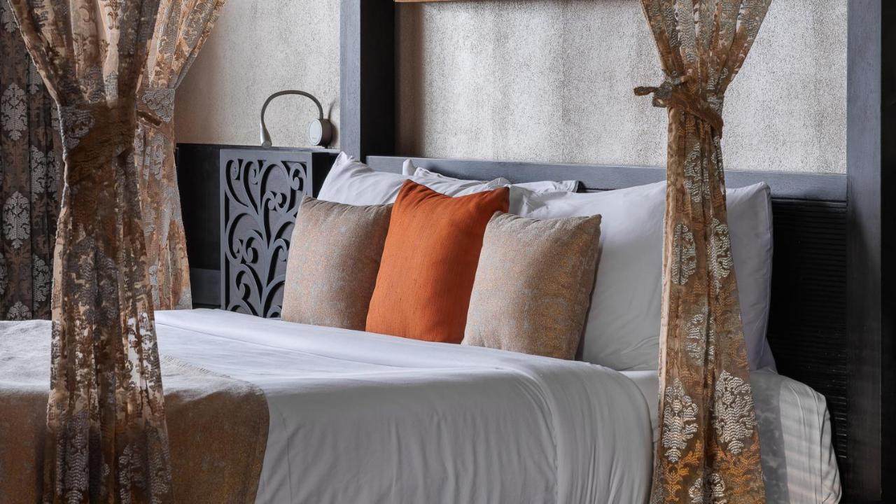 โรงแรมเดอะ พาโนรามิก เกตะเวย์ มุนนาร์ ภายนอก รูปภาพ A bed with cushions
