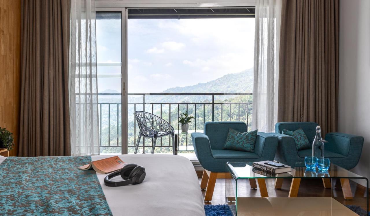 โรงแรมเดอะ พาโนรามิก เกตะเวย์ มุนนาร์ ภายนอก รูปภาพ A room at the hotel