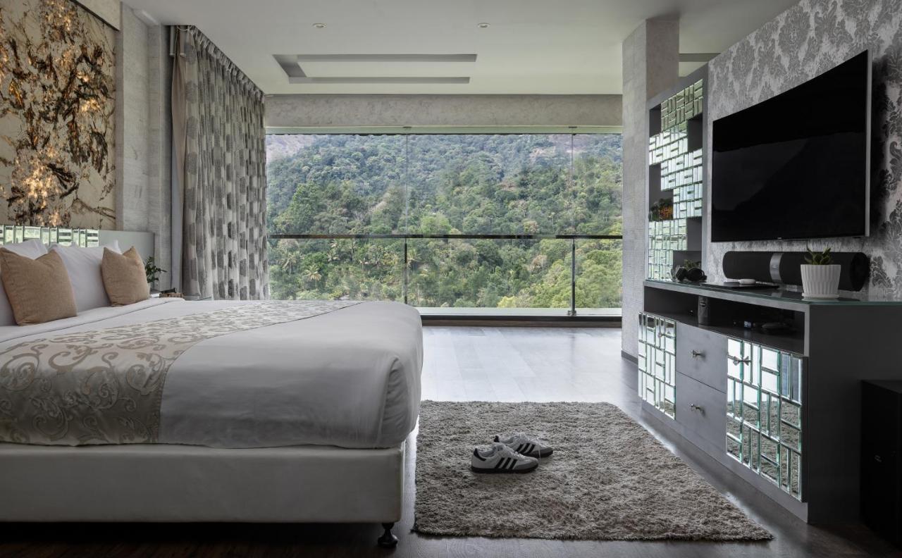โรงแรมเดอะ พาโนรามิก เกตะเวย์ มุนนาร์ ภายนอก รูปภาพ A bedroom at the hotel
